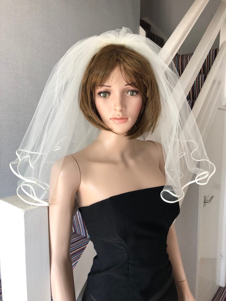 A Satin edged two layer veil