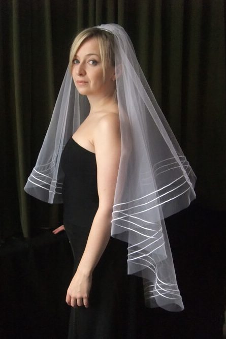 A triple wired hip length veil